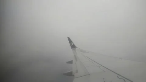Plane in the haze Stock-Footage 146323123