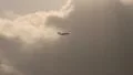 Plane heading towards stormclouds HD Footage