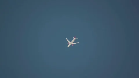 The plane is high in the sky. Dreamliner. Video stock 77660019