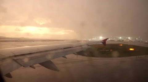 PLANE JET WING SKY LS 17 RAIN DROPS NIGHT TAKE OFF PREPARATION TAXI Stock Footage 44844307