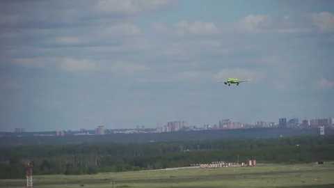 The plane landed on the runway in the evening at sunset at the airport. Russia Stock Footage 84586203