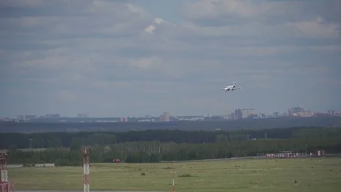 The plane landed on the runway in the evening at sunset at the airport. Russia Stock Footage 84593692