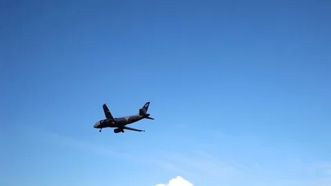 Plane landing in arport Stock Footage 77189645