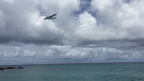 Plane Landing By Beach - St. Maarten Stock Footage 129054530