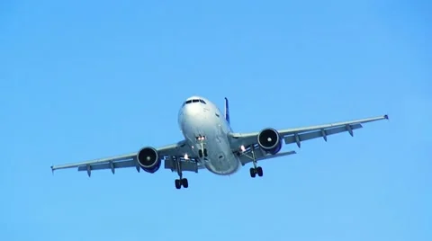 Plane landing. Blue sky. HD. Видео 10849062