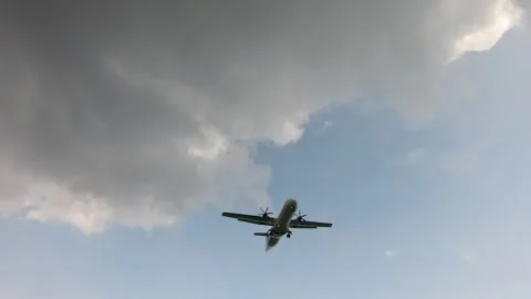 Plane is landing doesn't rotate propeller Stock Footage 154388713