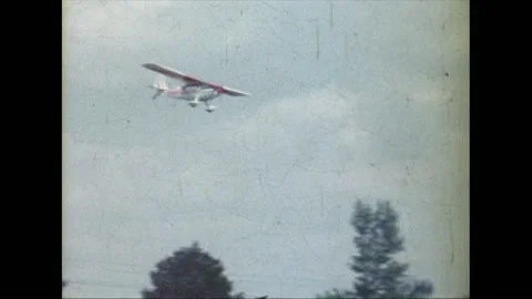 Plane Landing In Field Stock Footage 135188860