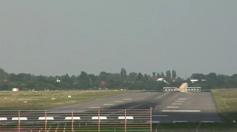 Plane landing at international airport Stock Footage