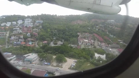 Plane landing over Koh Samui, aerial tropical from aircraft cabin window Stock Footage 337981365
