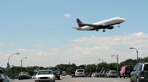 Plane landing over road Stock Footage 11188549