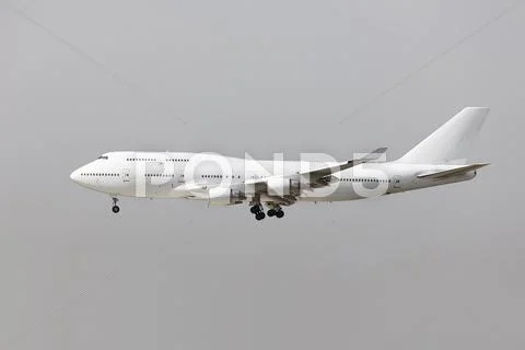 Plane landing Stock Photos