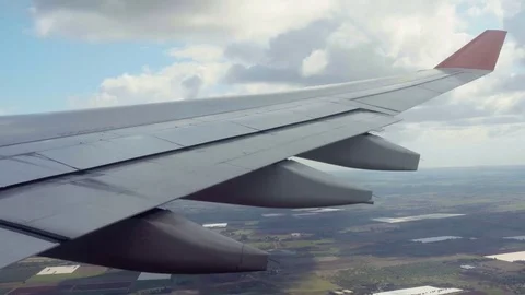 The plane is landing. Right wing. Stock Footage 72487176