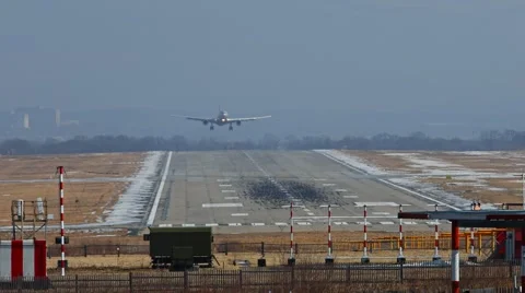 Plane landing on the runway Stock Footage 49407493