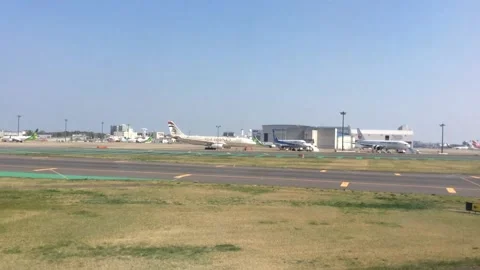 Plane landing on the runway Stock Footage 162244424