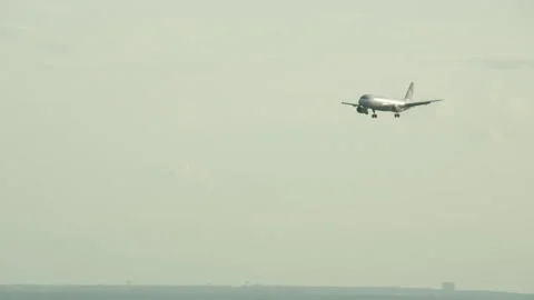 Plane landing on runway Stock Footage 197494865