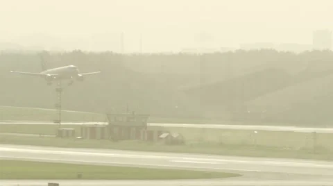 Plane landing shot from concourse Stock Footage 52818638