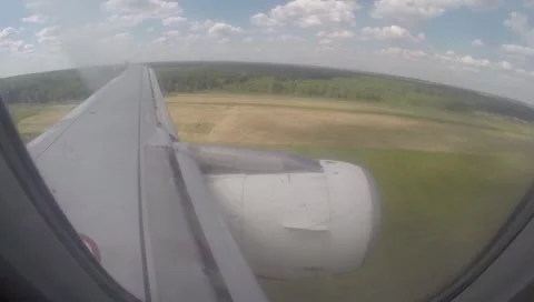 Plane landing shot though illuminator Stock Footage 52819258