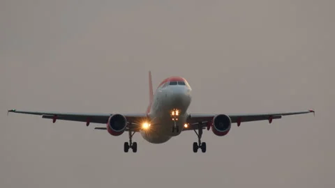 The plane is landing in slow motion Stock Footage 250282985
