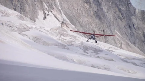 Plane landing on snowy landscape Video stock 100172243