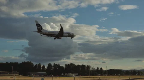 Plane Landing at Sunset Stock Footage 40390073