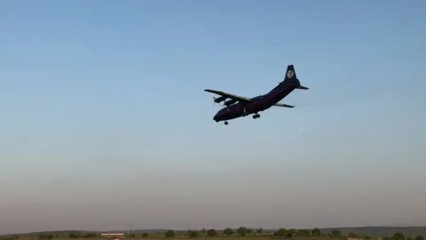 Plane landing view from the ground Stock Footage 200130914