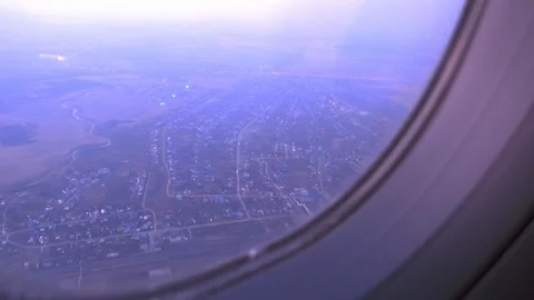 The plane lands in the evening Stock Footage 108075202