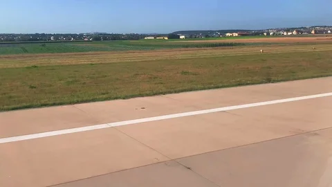 The plane lands on the runway Stock Footage 114759424