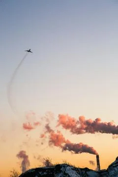 The plane lands at sunset 스톡 사진