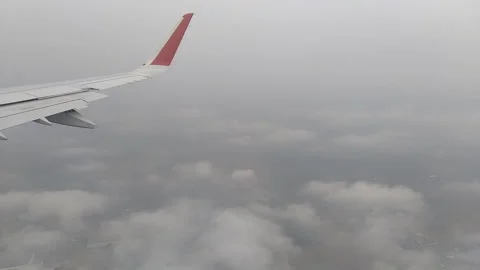 Plane lands in turbulence. View from the window Stock Footage 130385236