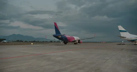 The plane leaves the runway Stock Footage 165628330