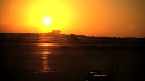 Plane Lending at sunset. Stock Footage 975070
