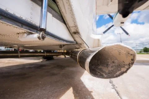 The plane made artificial rain Stock Photos