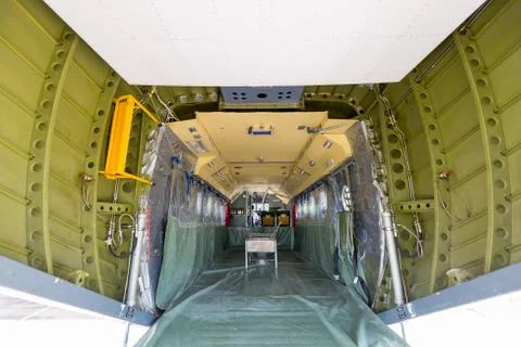 The plane made artificial rain Stock Photos