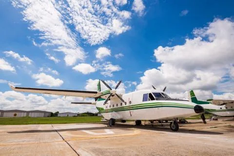 The plane made artificial rain Stock Photos