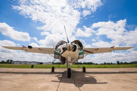 The plane made artificial rain Stock Photos