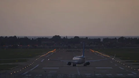The plane maneuvers on the runway Stock Footage 119885912