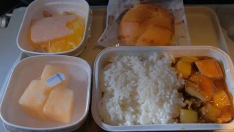 Plane meal provided by flight plane Stock Footage 125920358