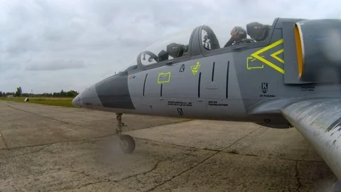 Plane move on runway and stops near number 7. View from the left wing close up. Stock Footage 118676779