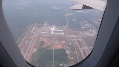 The plane moves along the runway view from the window of the plane. Video stock 115546791