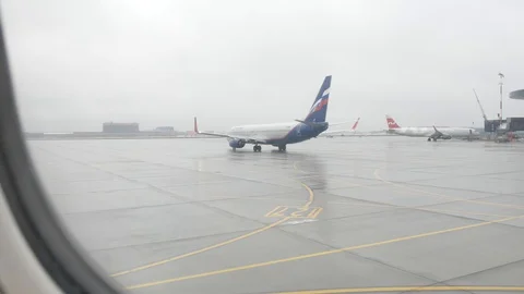 The plane moves to the runway Stock Footage 129772968