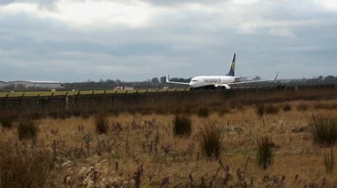 Plane moving along runway Stock Footage 46596237