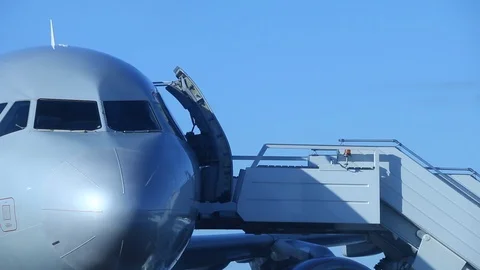 Plane with open door and ladder Stock Footage 99050433