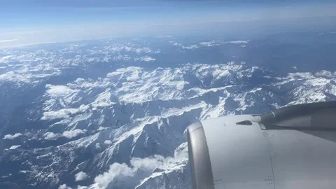 Plane over the Alps Stock Footage 313223835