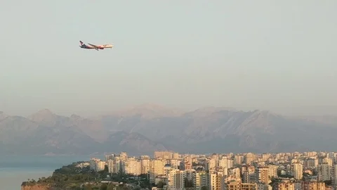 Plane over city 스톡 동영상 92764135