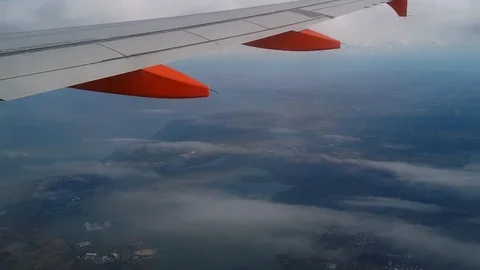 Plane over England coast Stock Footage 124513847