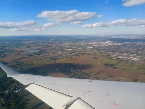 Plane Over Mississauga Fields Stock Photos