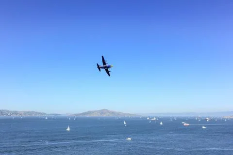 Plane over the sea. Stock Photos