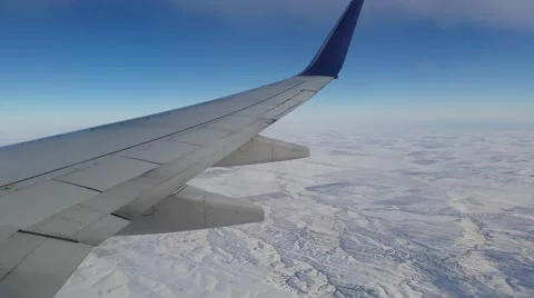 Plane Over Snow Landscape Stock Footage 47445027