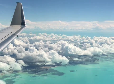 On the plane over turquoise ocean Stock Footage 170457266