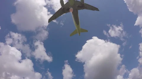 Plane passes low overhead, sky shot Stock Footage 50238114